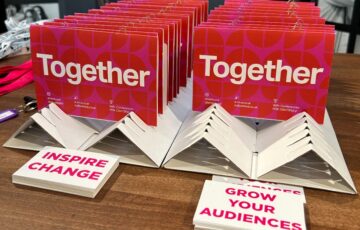 Rows of cards that say 'Together' and in the foreground one card that says 'Inspire change' and another that says 'Grow your audiences'