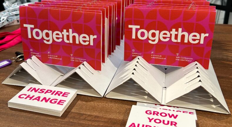 Rows of cards that say 'Together' and in the foreground one card that says 'Inspire change' and another that says 'Grow your audiences'