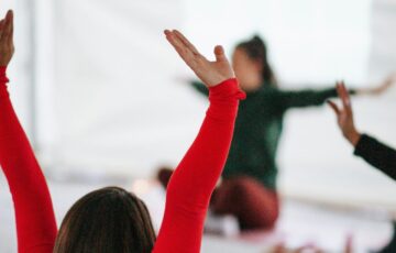 Blurred image of people stretching