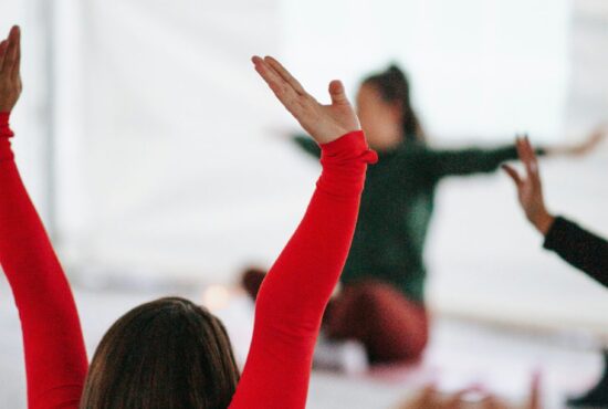 Blurred image of people stretching